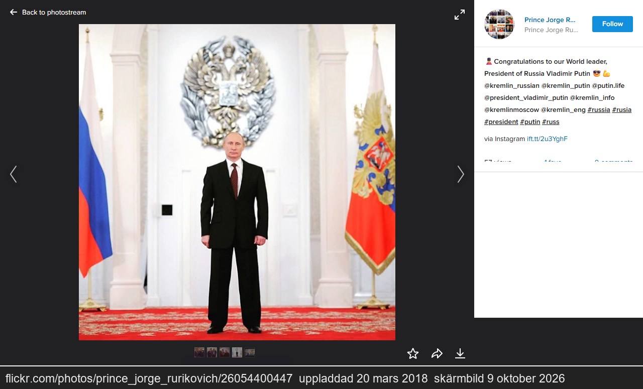 Screenshot of a Flickr post: Vladimir Putin stands in front of Russian flags and the state coat of arms, next to the congratulatory text.