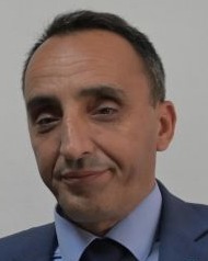 Portrait of Adnan Imeri, cropped from North Macedonia's government photo at the Pelince border station in 2023.