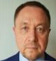 Portrait of Konstantin Sergey Vostrikov from IOED's presentation card.